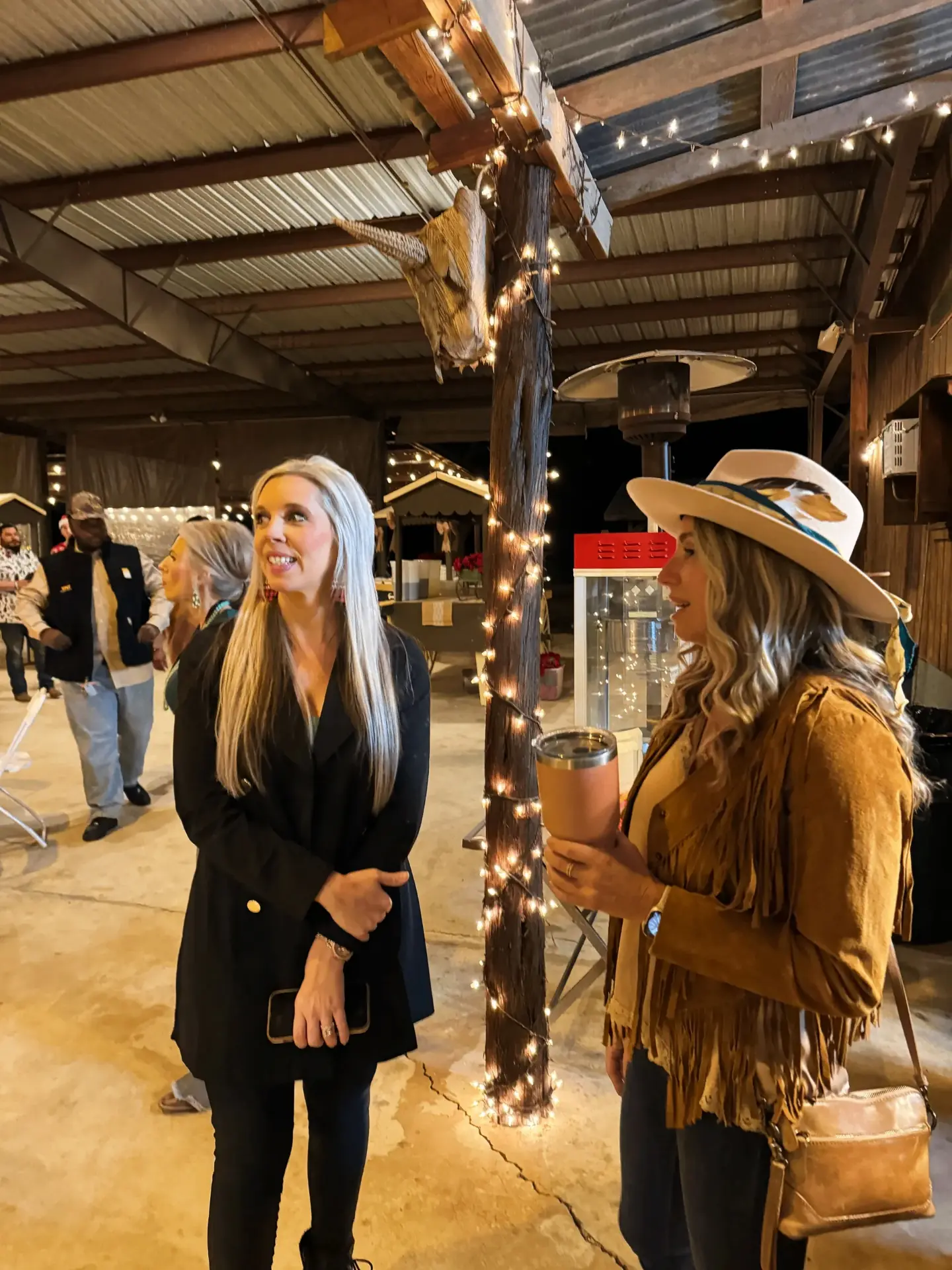 Corporate holiday party socializing at The Corral venue