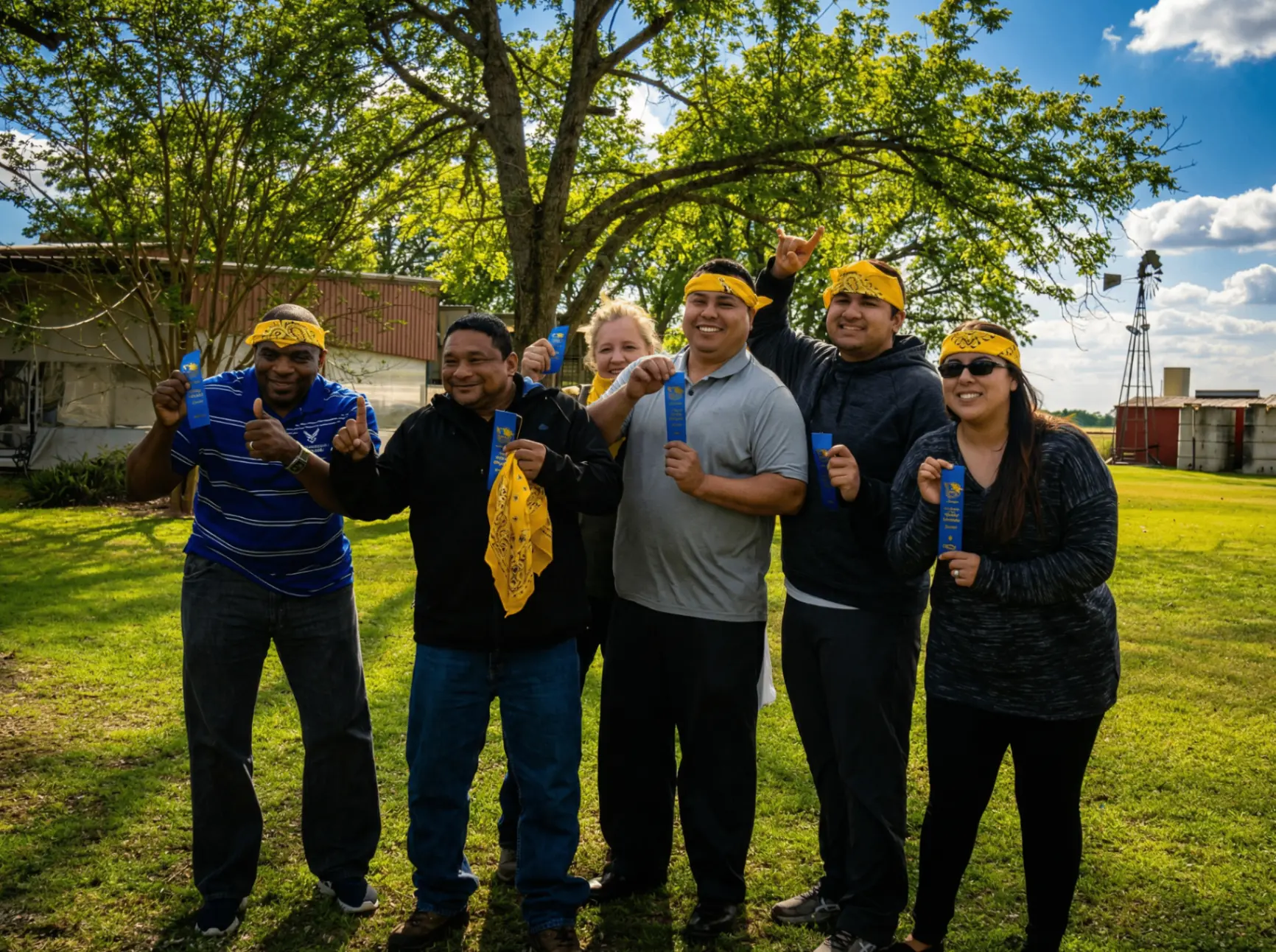 Team building winners celebrating at outdoor corporate outing near San Antonio Texas